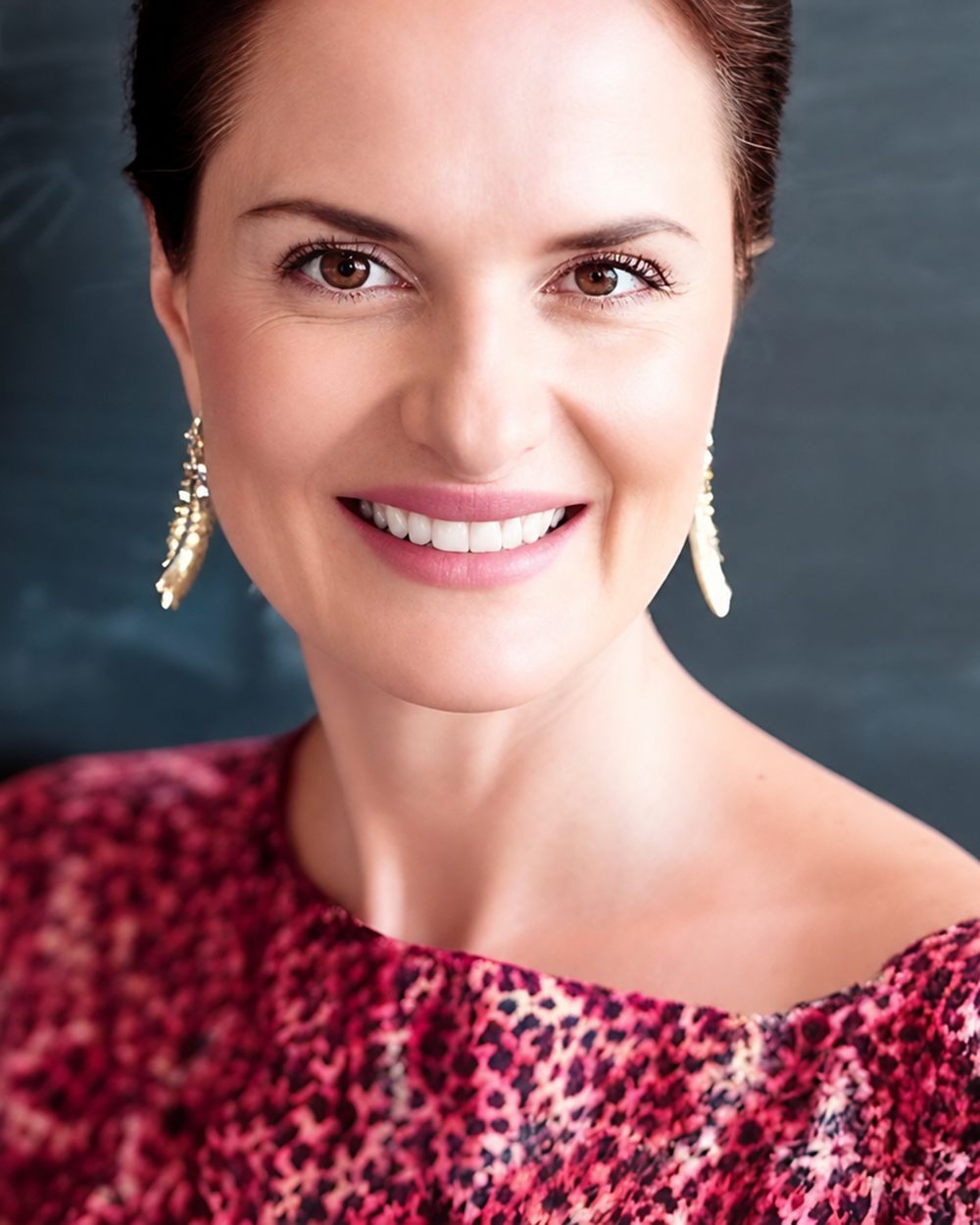Portrait of Natalie Delgado, insights and analytics leader and advisor